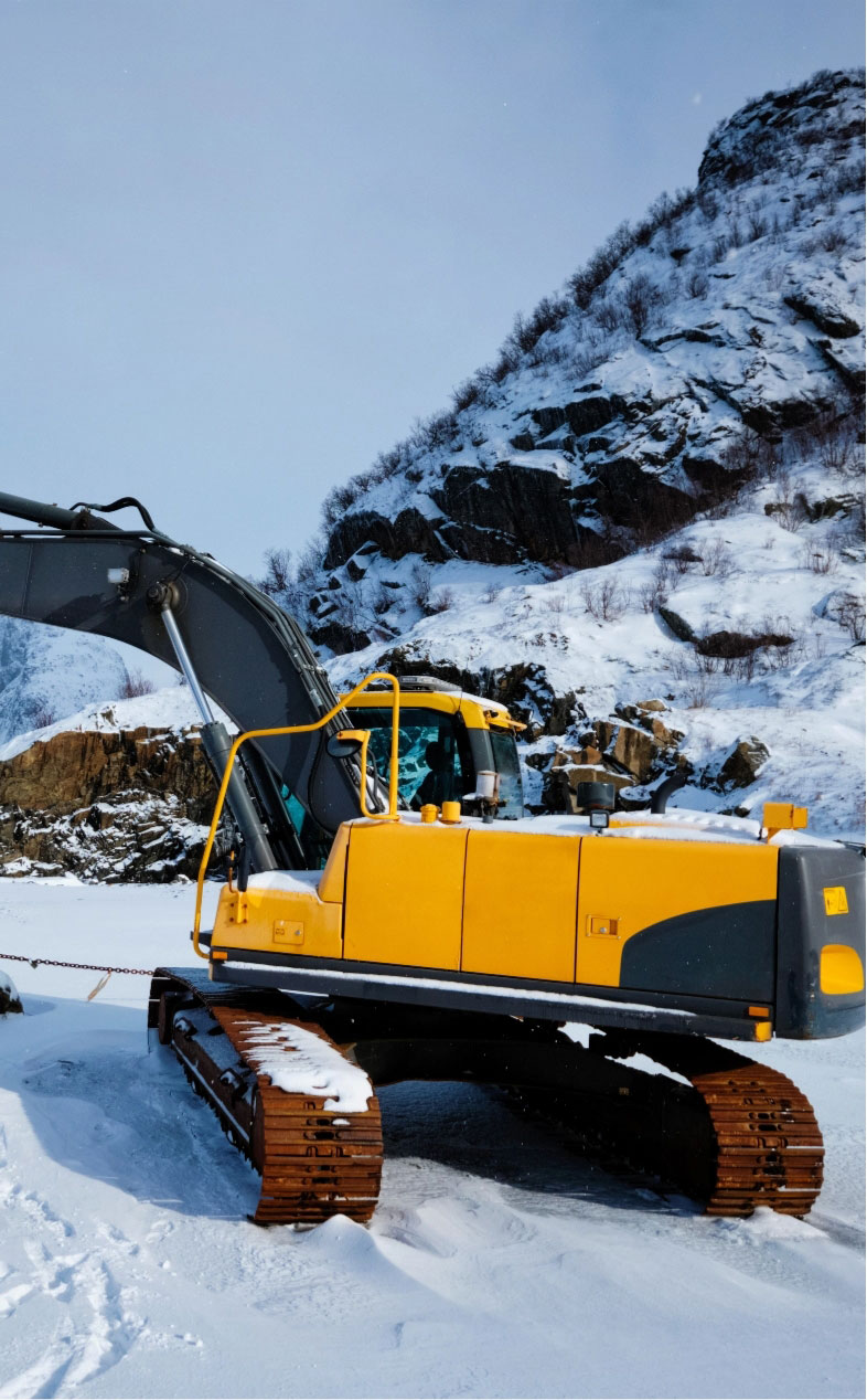 Excvator in snow