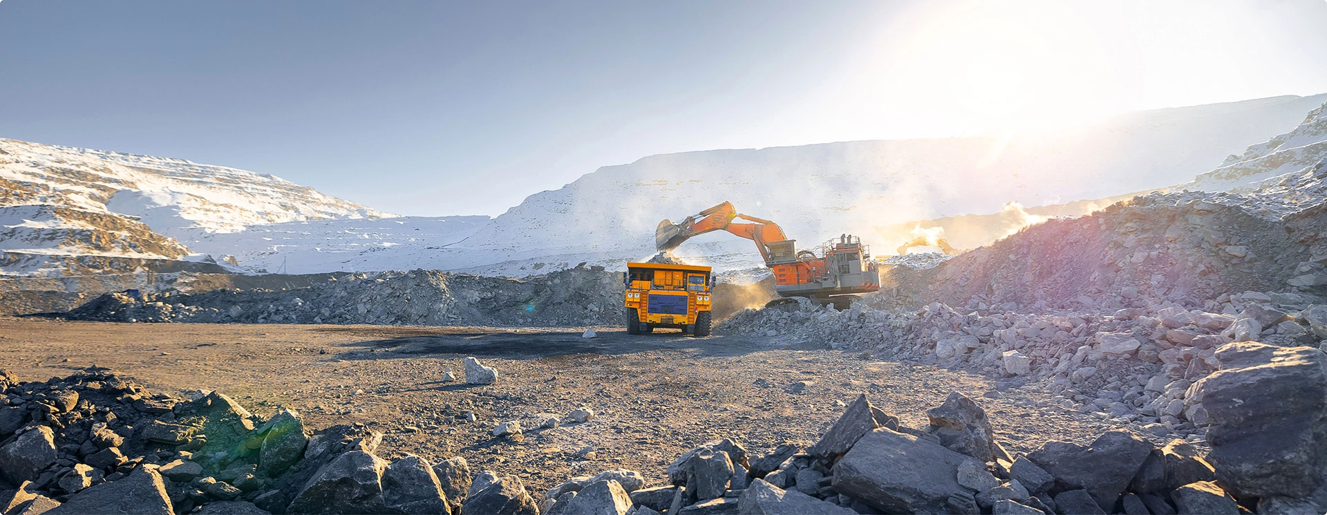 Excvator loading truck